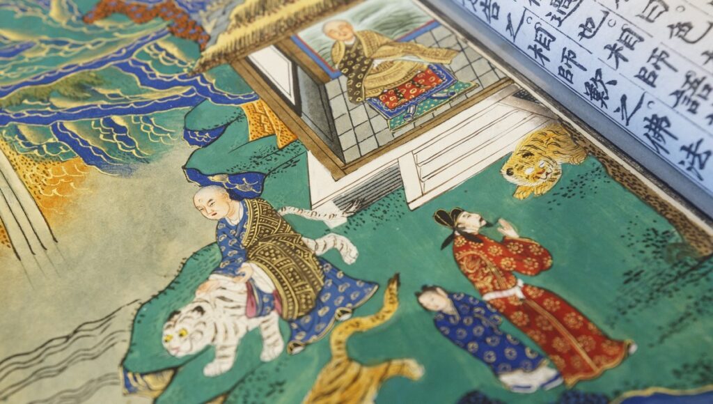 Цветная фотография 550-летней давности: сцена из китайского издания 15 века "Жизнь и деятельность Будды Шакьямуни, воплощенного в жизнь"
